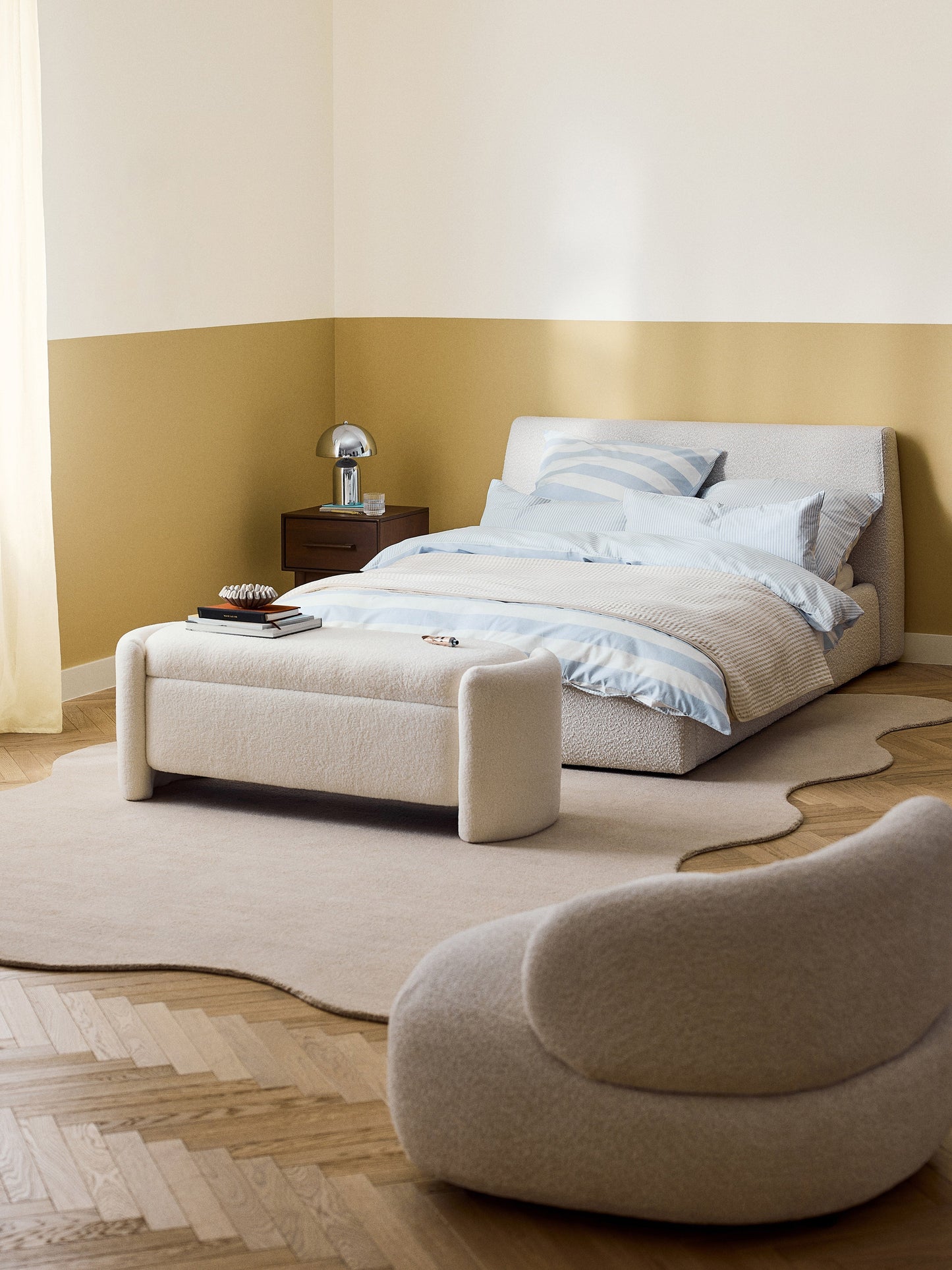 Clovarde Upholstered Bed in Bouclé