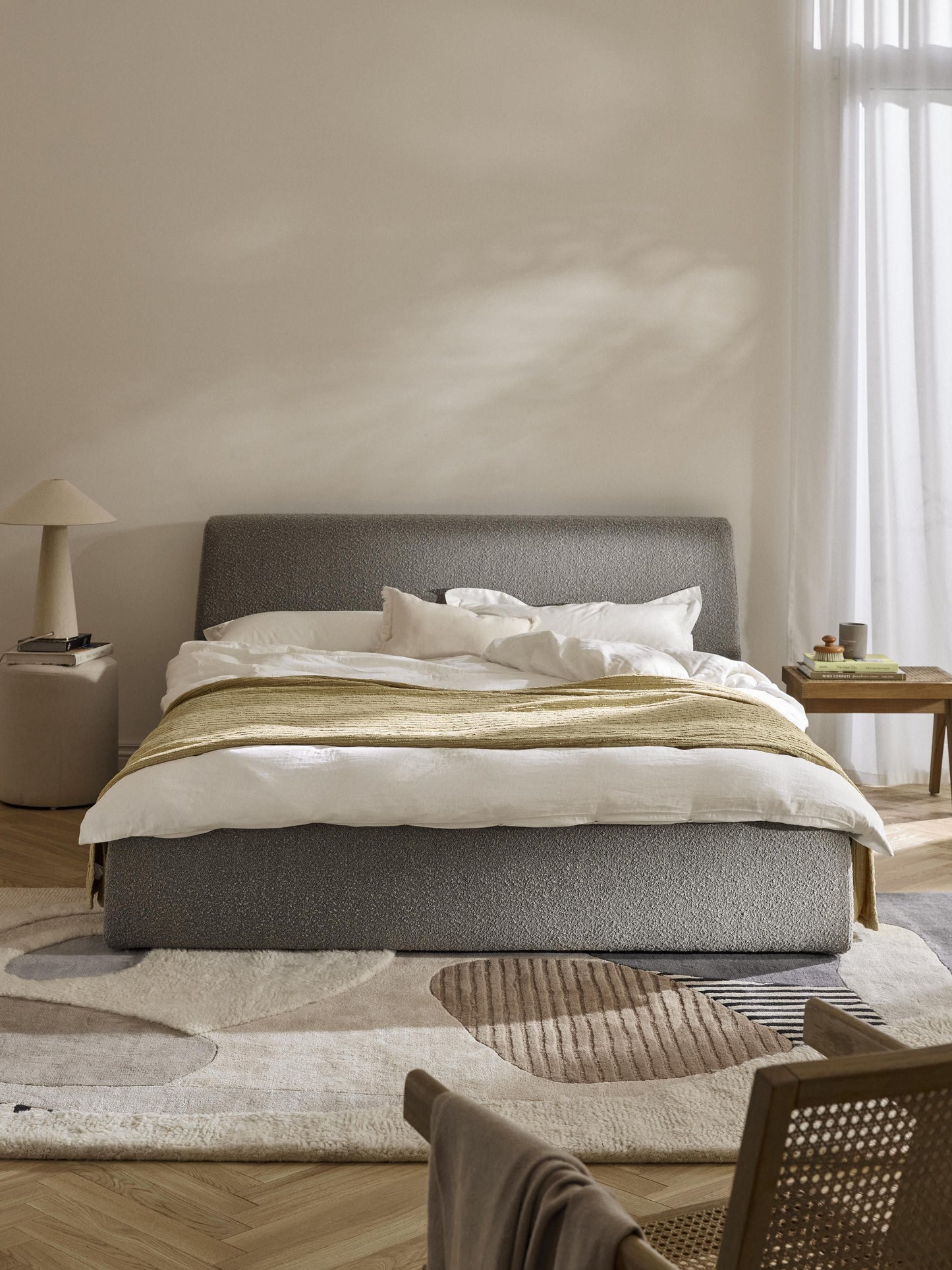 Clovarde Upholstered Bed in Bouclé