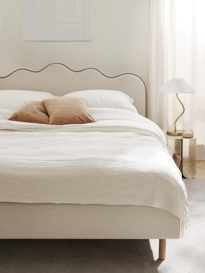 Romkade Upholstered Bed with Wavy Headboard